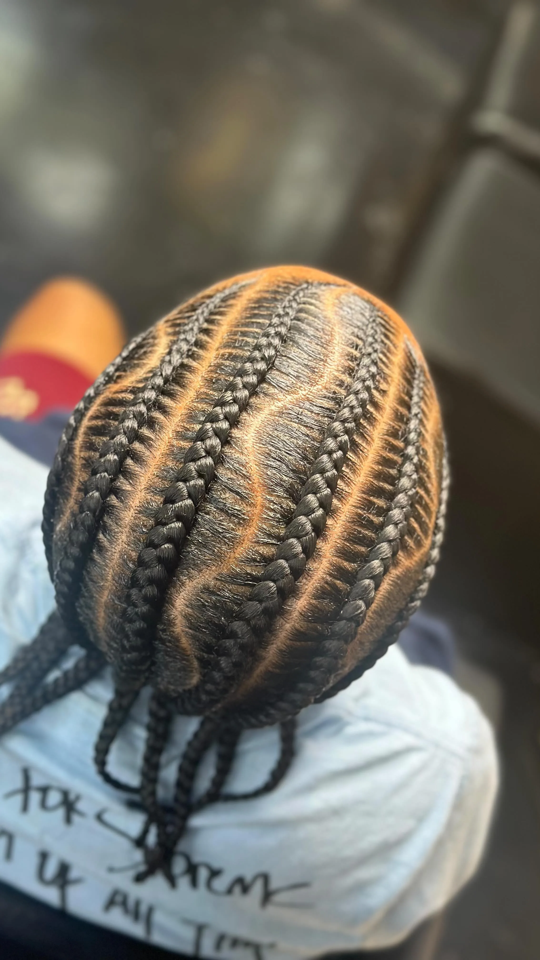 Close-up of stitch braids by Tasha's Touch ATL